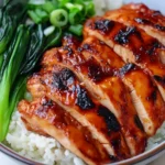 Char Siu Chicken glazed and sliced over white rice with bok choy and green onions