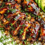 Best Hawaiian BBQ Chicken glazed in sweet-savory sauce served over rice with avocado slices