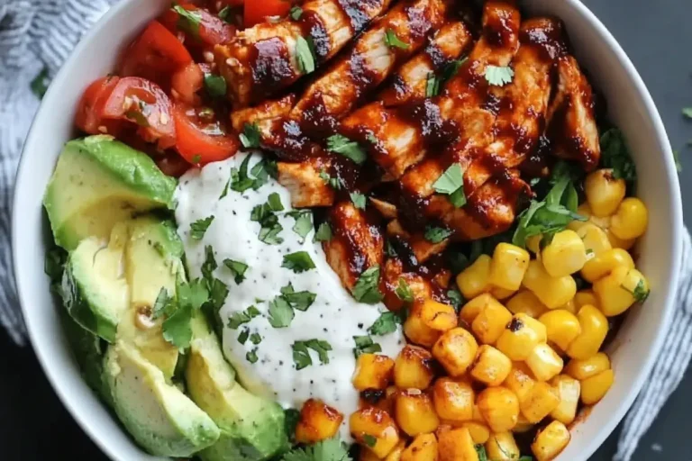 High Protein BBQ Chicken Ranch Bowl with grilled chicken, avocado, corn, tomatoes, and creamy ranch dressing.