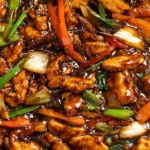 Chicken in Garlic Sauce Chinese with colorful vegetables in a glossy savory sauce