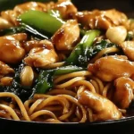 Garlic Chicken Lo Mein with juicy chicken, fresh vegetables, and noodles in savory garlic sauce