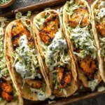 Sheet Pan Chicken Pitas filled with juicy grilled chicken, crunchy slaw, and creamy herby ranch sauce on warm pita bread.