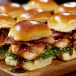 Juicy Maple Chicken Beef Bacon Sliders with crispy beef bacon, maple glaze, and fresh greens on fluffy slider buns.