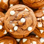 Freshly baked White Chocolate Pumpkin Snickerdoodles topped with white chocolate chips.
