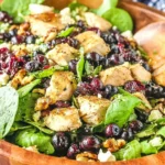 Chicken Blueberry Feta Salad with grilled chicken, fresh blueberries, cranberries, feta, and greens tossed in balsamic vinaigrette.