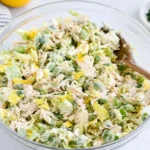 Pepperoncini Chicken Salad in a glass bowl with shredded chicken, celery, dill, and lemon—creamy, tangy, and ready for lunch.
