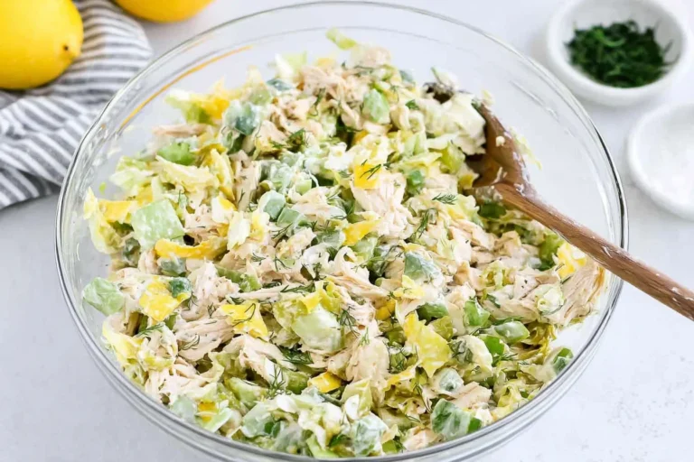 Pepperoncini Chicken Salad in a glass bowl with shredded chicken, celery, dill, and lemon—creamy, tangy, and ready for lunch.