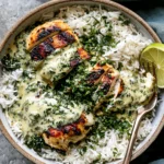 Creamy Herb Chicken & Basmati Rice served with juicy herb chicken, fluffy basmati rice, creamy garlic herb sauce, fresh parsley, and lime.