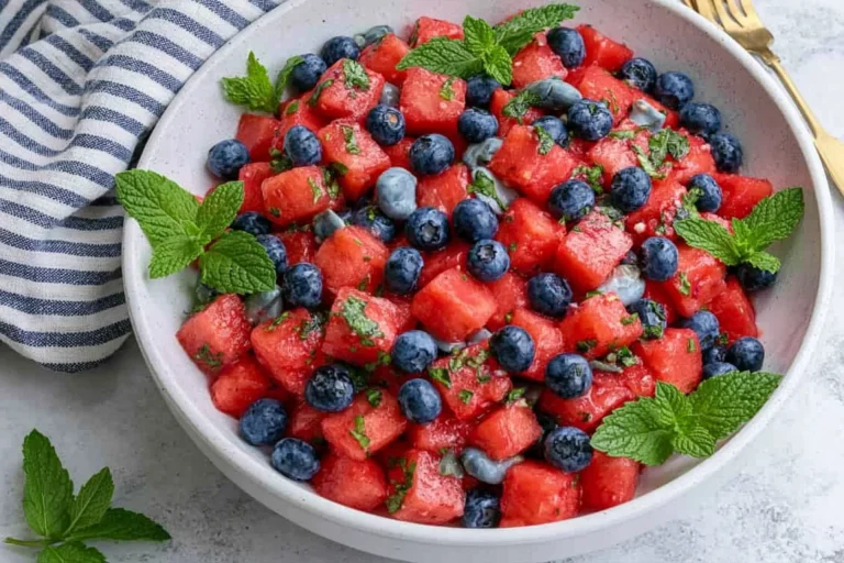 Watermelon Blueberry Salad with fresh blueberries, mint, honey, and lime served in a bowl for a refreshing summer side dish.